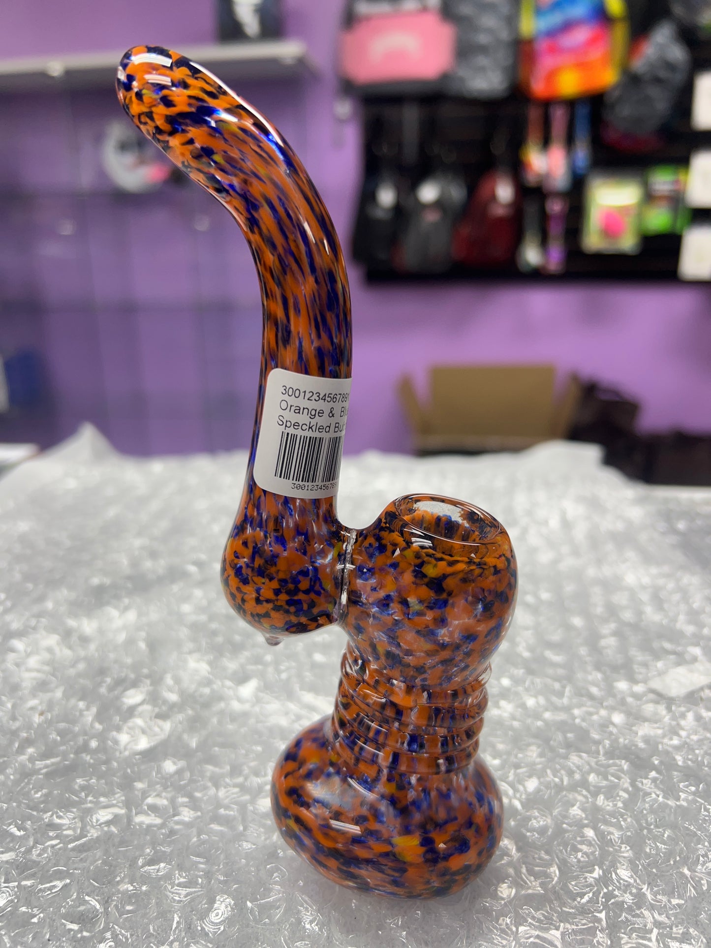 Orange and blue speckled bubbler